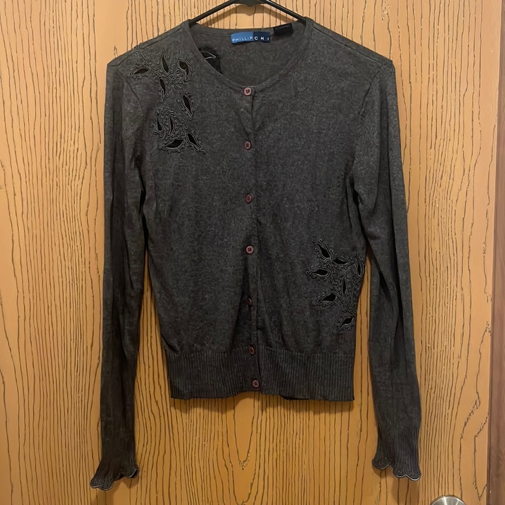 Dark grey cardigan. Women’s silk & cashmere medium but fits like a small.
